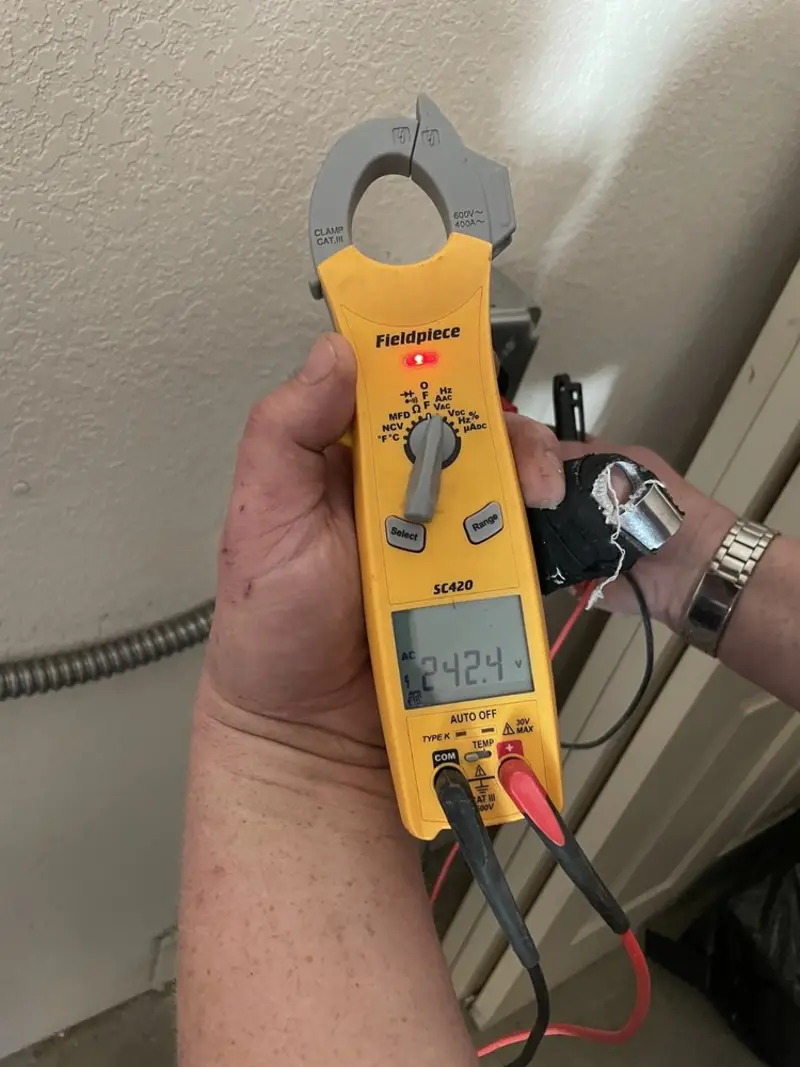 Voltage testing with clamp meter during Aluminum Wiring Replacement in Bellaire